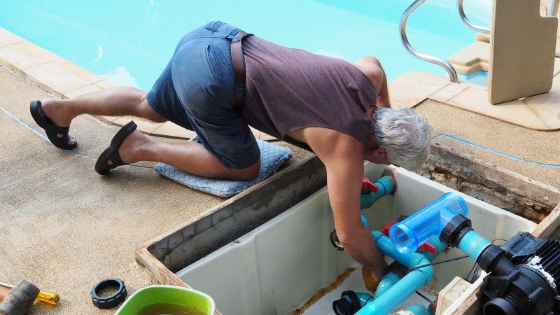 Pool Service Technician at Work